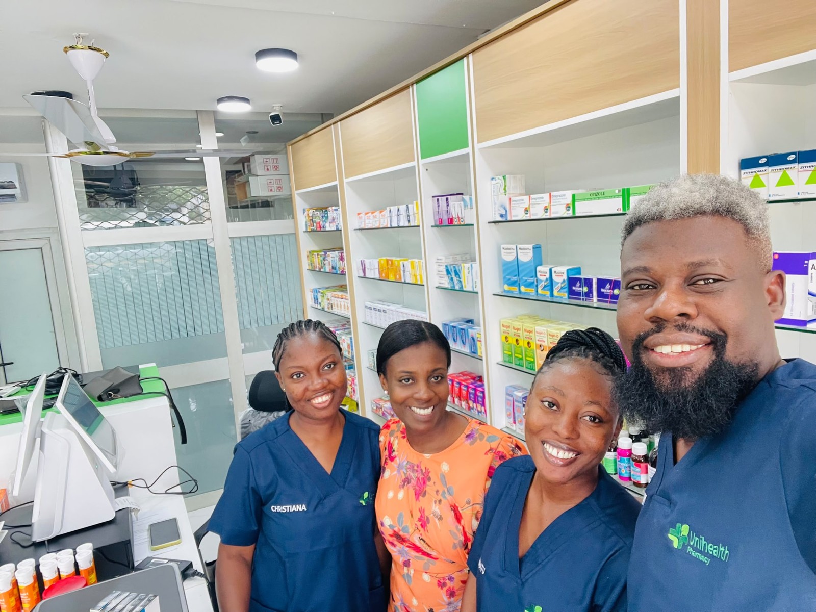 The Unihealth team together inside the pharmacy.